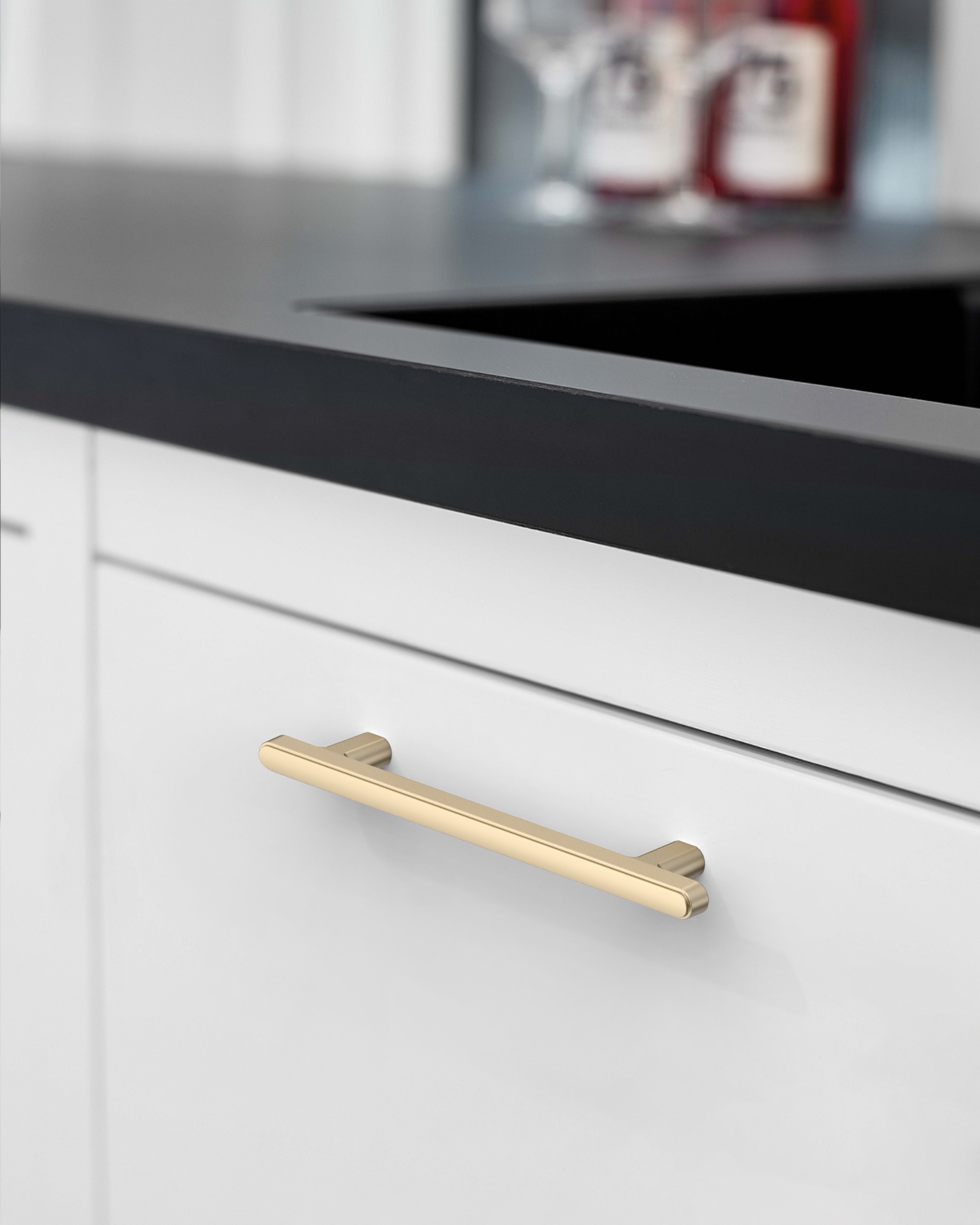 2244-brushed-brass-cabinet-handles-Installed-on-White-Cabinets