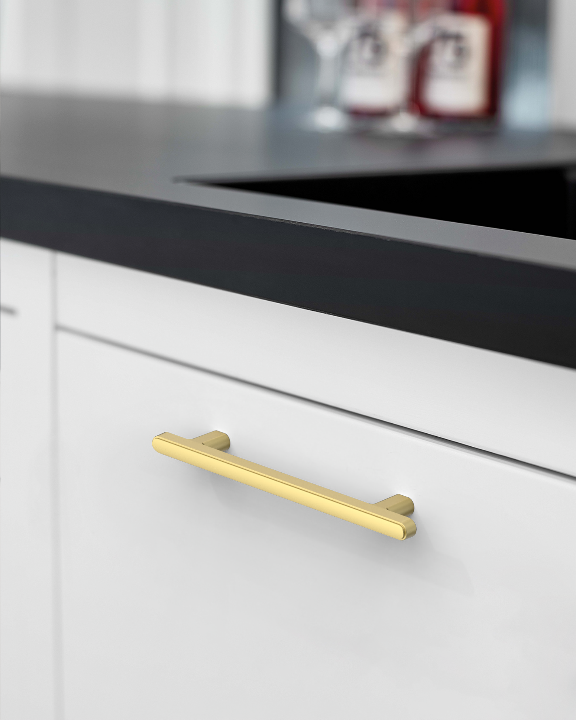 2244-brushed-gold-cabinet-handles-Installed-on-White-Cabinets