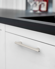 2244-brushed-stain-nickel-cabinet-handles-on-White-Kitchen-Cabinets