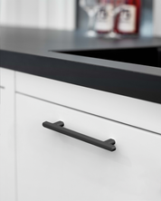2244-matte-black-cabinet-handles-Installed-on-White-Cabinets