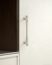Design2322 Decorative Turned Pulls | Walnut Wood & White Raised Panel Cabinets